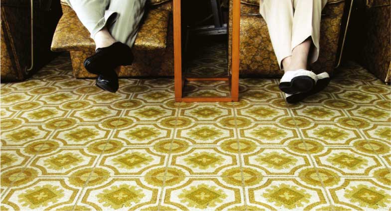 Underneath carpet or vinyl flooring